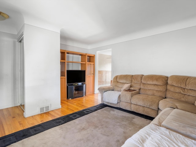 living room with hardwood / wood-style floors