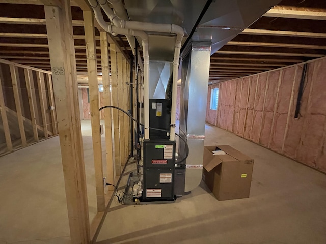2412 W Garfield, New Era, MI 49446 - unfinished basement featuring heating unit