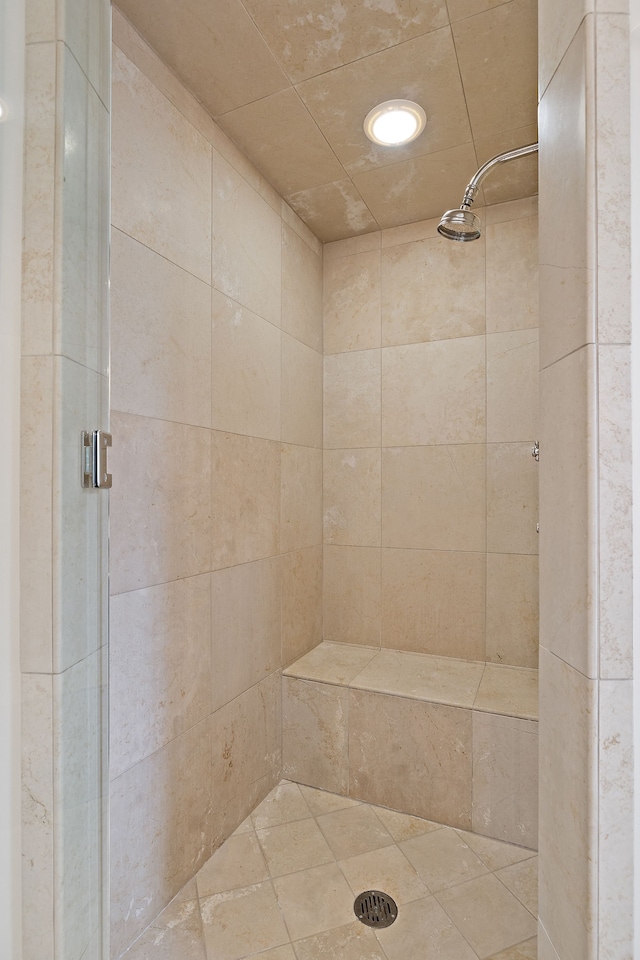 full bath featuring a shower stall