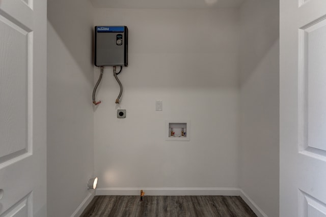 clothes washing area featuring hookup for an electric dryer, dark hardwood / wood-style floors, and hookup for a washing machine