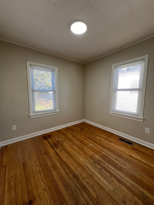 empty room featuring hardwood / wood-style floors