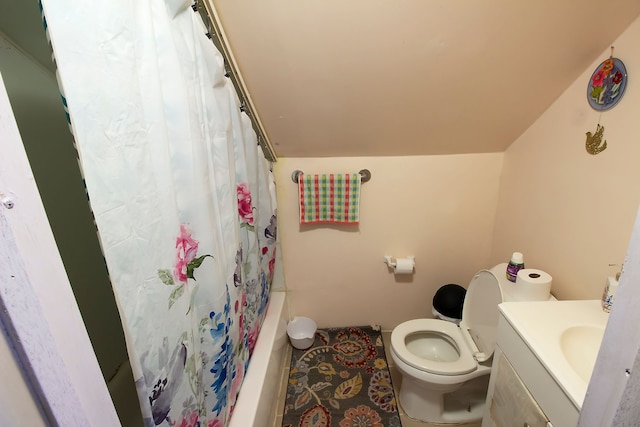 full bathroom with vanity, shower / bath combo, and toilet