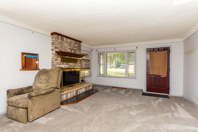 carpeted living room with a textured ceiling and a brick fireplace