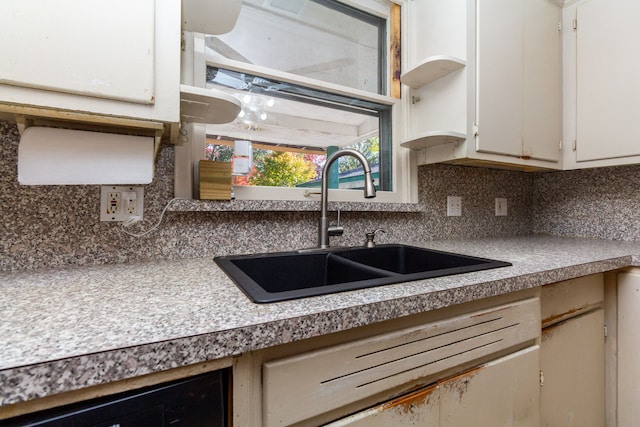 21048 Whitlock St, Farmington Hills, MI 48336 - kitchen featuring a sink, open shelves, decorative backsplash, and white cabinetry