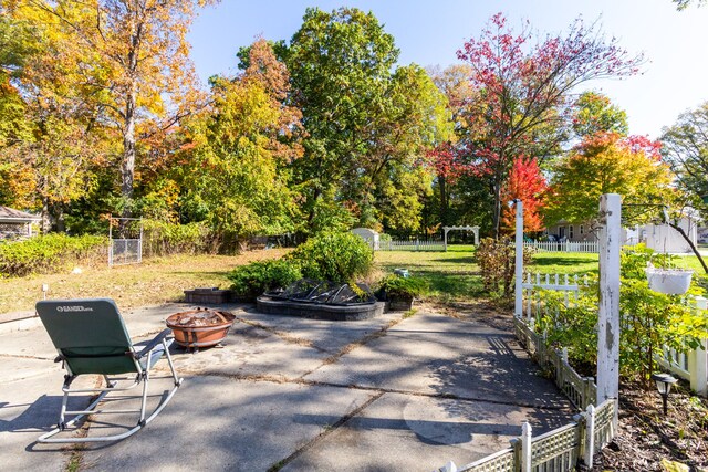 21048 Whitlock St, Farmington Hills, MI 48336 - view of patio / terrace featuring an outdoor fire pit