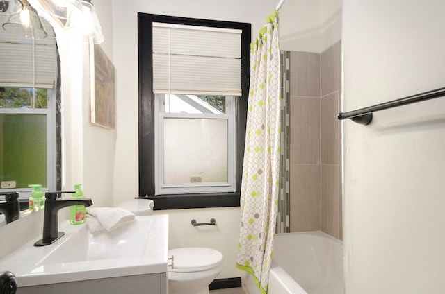 full bathroom featuring vanity, toilet, and shower / bath combo with shower curtain