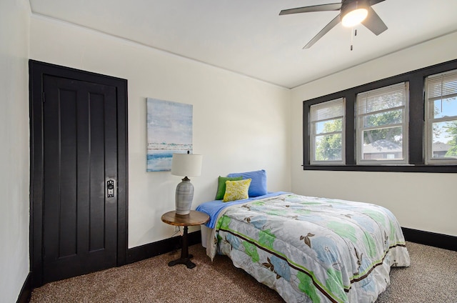 carpeted bedroom with ceiling fan