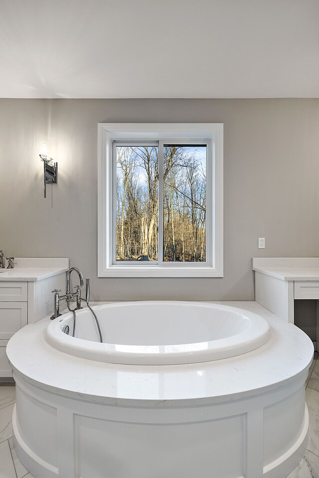 2280 Heidi Dr, Oxford, MI 48370 - bathroom featuring a garden tub