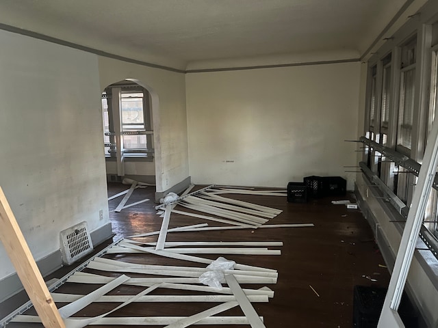 miscellaneous room with dark wood-type flooring