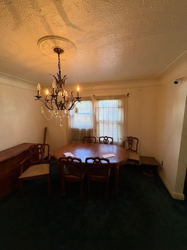 dining area featuring a textured ceiling and an inviting chandelier