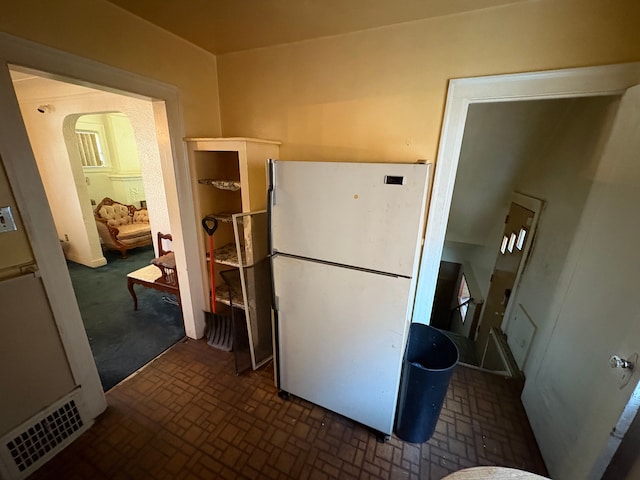 kitchen featuring white refrigerator