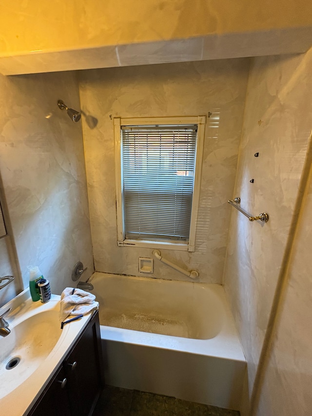 bathroom featuring vanity and tub / shower combination