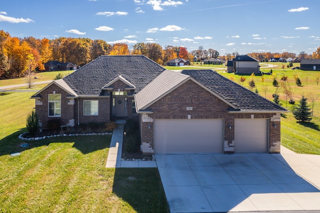 single story home featuring a garage and a front lawn