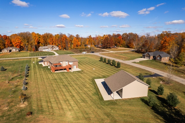 birds eye view of property with a rural view