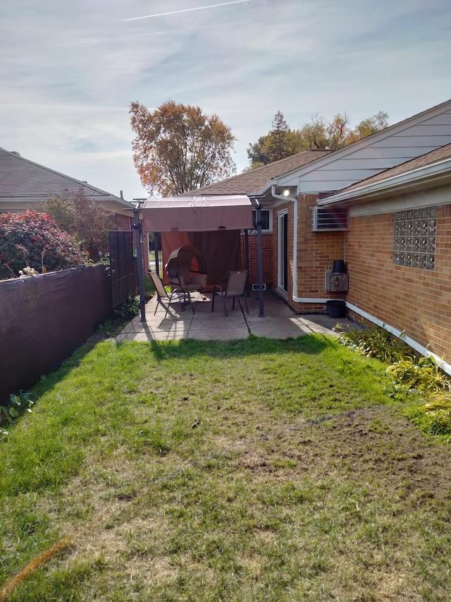 view of yard with a gazebo and a patio area