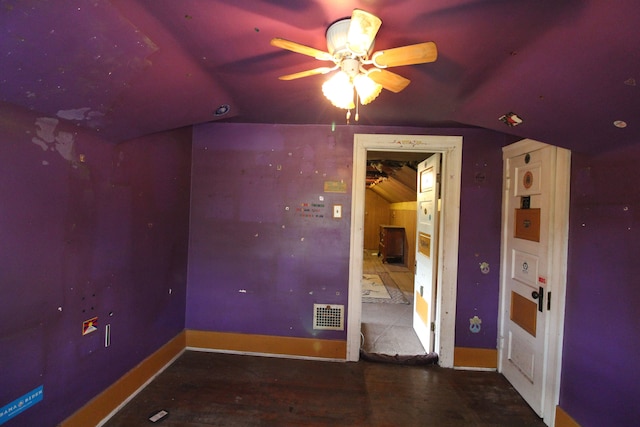 interior space with ceiling fan and lofted ceiling