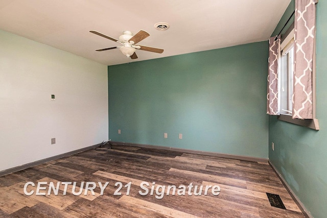 spare room with ceiling fan and hardwood / wood-style floors