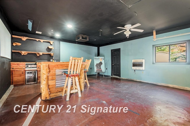 kitchen featuring ceiling fan, beverage cooler, and heating unit