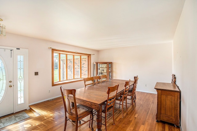 dining room featuring hardwood / wood-style flooring