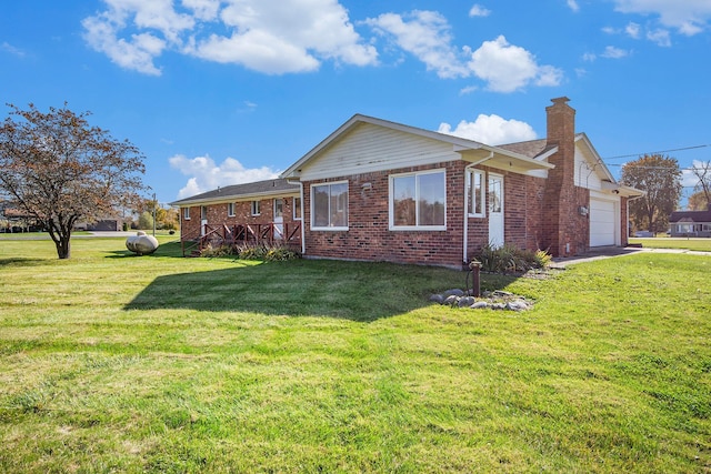 view of property exterior with a yard and a garage