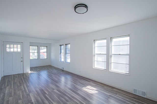 interior space with dark wood-type flooring