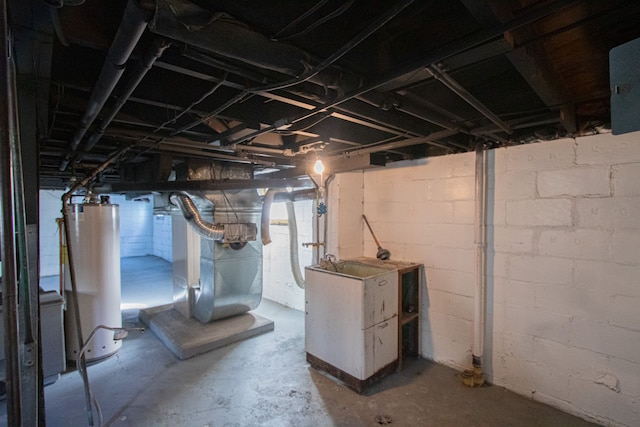 basement with heating unit and water heater