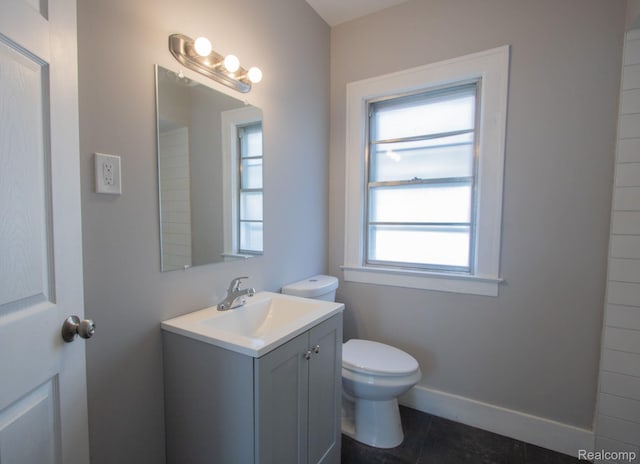 23930 Elmira St, Saint Clair Shores, MI 48082 - bathroom featuring healthy amount of natural light, tile patterned floors, and vanity