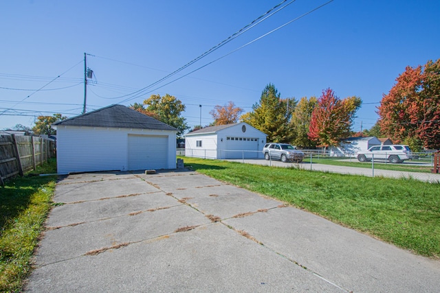 garage featuring a yard