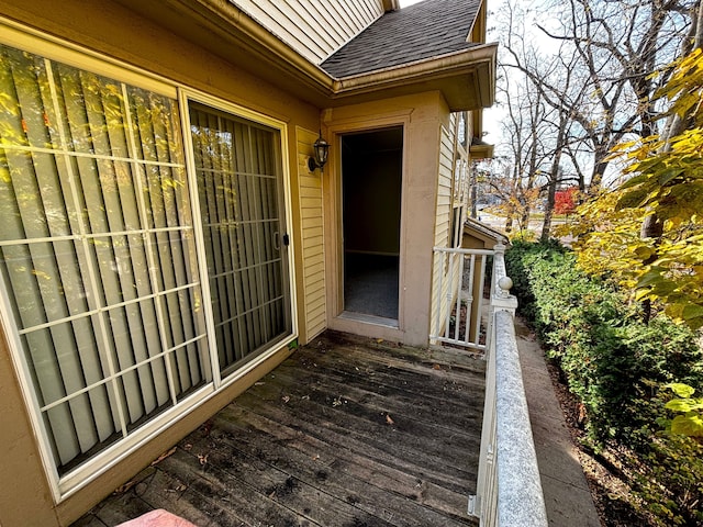 entrance to property with a wooden deck