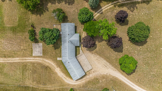 birds eye view of property with a rural view