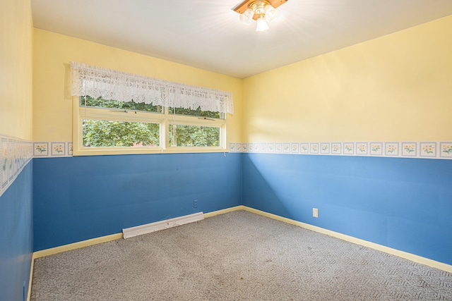 spare room with carpet flooring