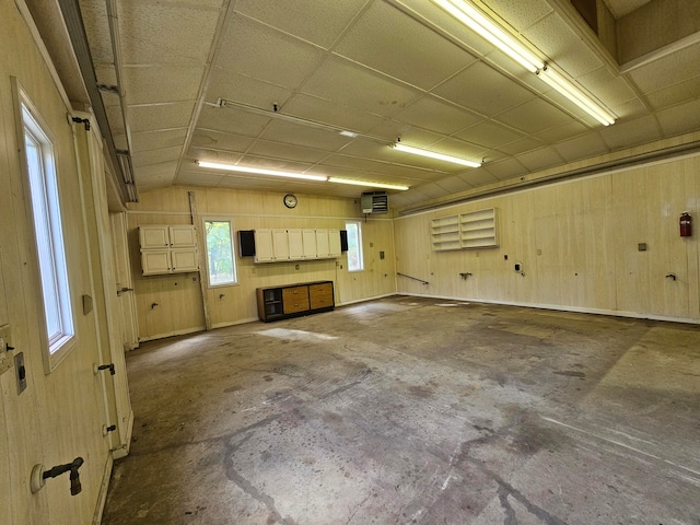 garage with wood walls