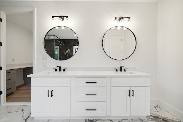 bathroom featuring vanity and a shower