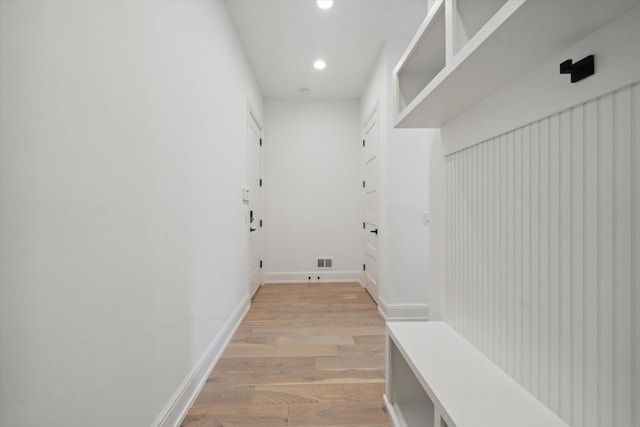 mudroom with light wood-type flooring