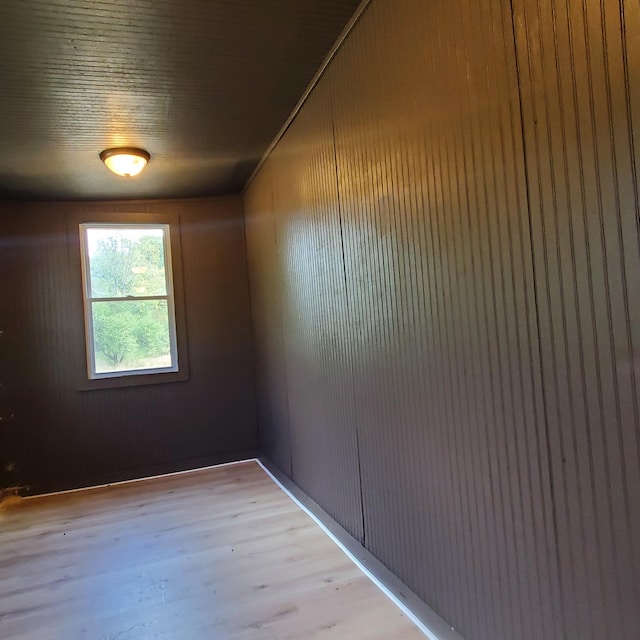 unfurnished room featuring light hardwood / wood-style floors