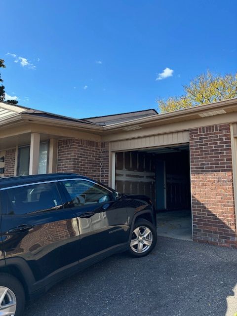 view of property exterior featuring a garage