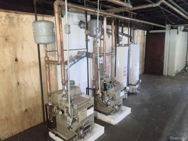 utility room featuring gas water heater