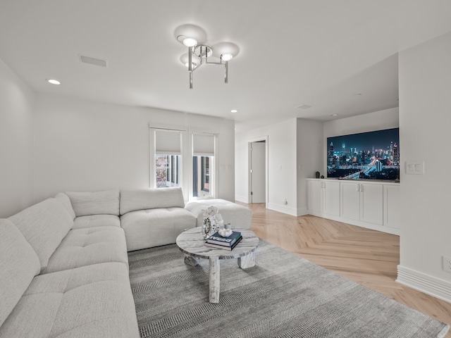 living room featuring parquet floors