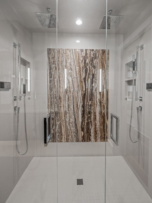 bathroom featuring an enclosed shower