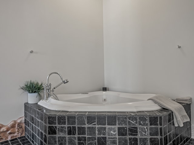 bathroom with tiled tub