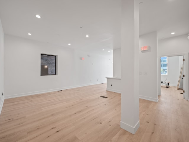 unfurnished living room featuring light wood-type flooring