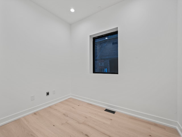 empty room with light wood-type flooring