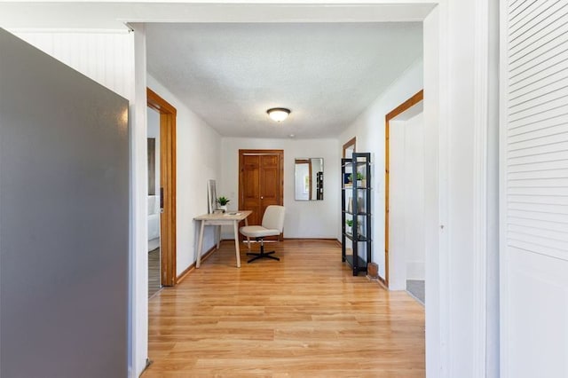 hall featuring light wood-type flooring