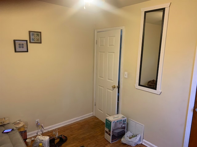 miscellaneous room featuring hardwood / wood-style flooring