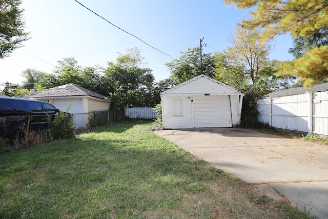 garage with a lawn