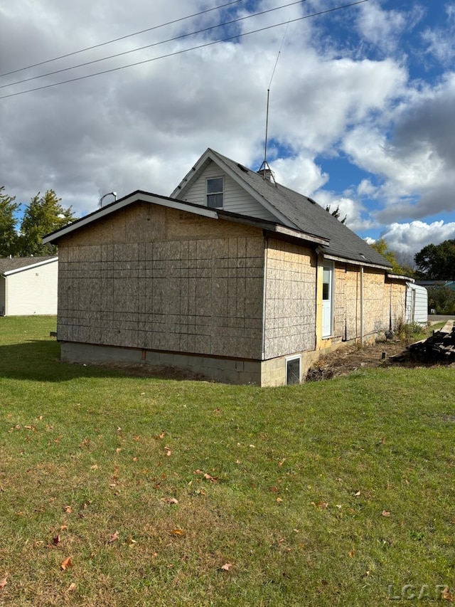 view of property exterior featuring a yard