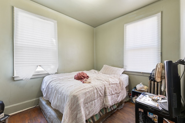 bedroom featuring dark hardwood / wood-style floors