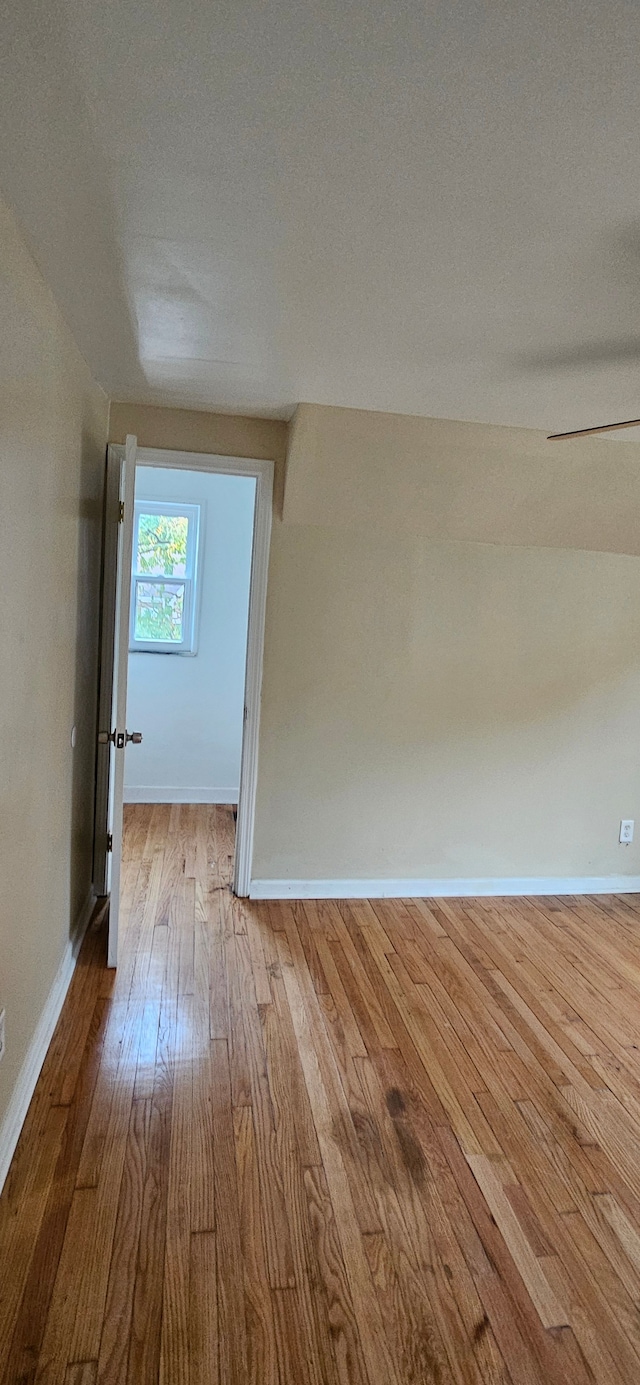 spare room featuring light hardwood / wood-style flooring