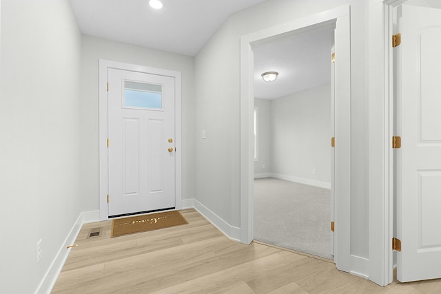 foyer with light hardwood / wood-style flooring