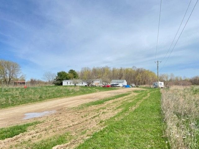 view of road with a rural view